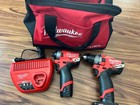 New  - Milwaukee 2553-20 Fuel Impact Drill   Hammer Drillbattery   Charger   Bag