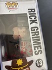 Funko Pop  The Walking Dead Rick Grimes  13 Bloody Harrison s Comics Box Damage