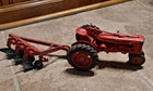 Vintage Farmall Tractor With Bottom Plow