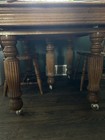 Antique Solid Wood Dining Table On Casters     Turned Legs     Pickup Only