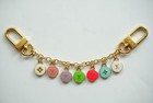 Lv Keychain Gold    Pink  Colored