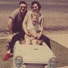 Vintage Color Snapshot Photo Man Woman Family Sitting In Toy Pedal Car 1950s