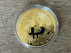 Physical Bitcoin With Gold Luster In Protective Case