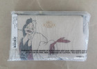 Disney X Coach Corner Zip Wristlet With Cruella Motif
