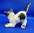 Vintage Porcelain Playful Cat Figurine Black White Kitten Crouching  5 5  X 5 5   