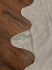 Arhaus Light Brindle Hide  Width 84    Depth 78    Height 0 5     Weight 7 Pounds