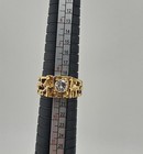 Gold Tone Lord Of The Rings Style Ring With Clear Stone