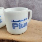 Humana Care Plus Vintage Milk Glass Mug Cup Rare Lot Of 2 Anchor Hocking Usa