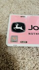 John Deere Embossed License Plate - Nothing Runs Like A Deere - Pink  new 