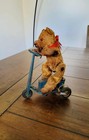 Vintage Gebruder Fewo German Wind Up Bear With Glass Eyes On Tin Plate Scooter