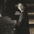 Vintage Snapshot Photo Ohio Woman Round Glasses Moody Interior Portrait