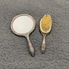 Vintage Silver Tone Ornate Floral Embossed Hand Mirror And Hair Brush Vanity Set