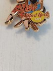 Hard Rock Cafe Hollywood Director Girl Black Hair Tiger Pants Chair Gold Trim   