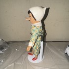 Vintage Pinocchio-styled Composition Doll In Floral Print Outfit 