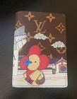 Luis Vuitton Vivienne Passport Holder