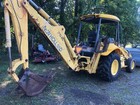New Holland L75b Backhoe Loader With Clam Bucket