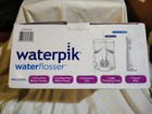 Sealed Box - Waterpik Ultra Plus And Cordless Pearl Water Flosser Combo Pack