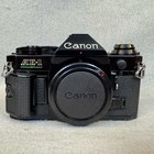 Canon Ae-1 Program Kit Black Lenses 70-210 Mm 50mw Flash  Brush Case Manuals
