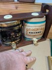 Large Barrels In Wooden Frame
