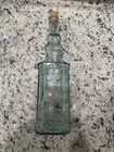 Glass Decorating Bottle 11 75   h Clear W slight Tint Raised Design Vtg Apothecary