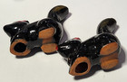 2 Vintage Skunk Figurines Red Ware