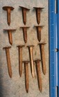 12 Different National Lumber Date Nails 1927-1938