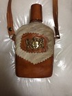 Fur And Leather Flask With Emblem
