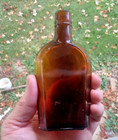 Amber 5 3 4 mini Coffin Shoo Fly Whiskey Flask Paneled Knife Edge Hand Blown