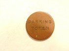 Older Tarnished Metal Ucla Parking Token
