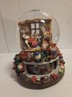 Large Musical Snow Globe With Rotating Base Features Santa And Elves