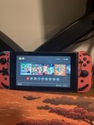 Nintendo Switch Console Bundle W  Dock  Controller  Crkd Nitro Deck  And Case 
