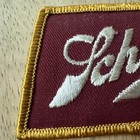 Vintage 1970s Schlitz Beer Embroidered Uniform Maroon Patch - New Old Stock