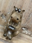 Hippo Figurine On The Toilet