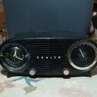 Zenith Black Analog Oval Clock Radio With Alarm And Arabic Numerals