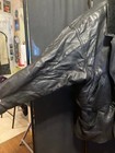 Elton John s Heavy Black Gianni Versace Leather Jacket - Sotheby s 1988 Auction