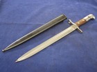 One Swiss K31 Bayonet With Scabbard - No Serials  Unissued - Blemished 