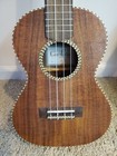 Cordoba Ukulele Used- Model 25 T With Gig Bag--solid Acacia Top  A Real Bone Nut