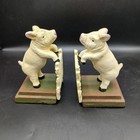 Cast Iron Painted Bookends  Pair Of Pigs Jumping White Fence