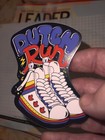 Dutch Bros Sticker Sept 2025     Dutch Run Shoes Limited Coffee Collectible