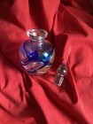 Hand-blown Art Glass Perfume Bottle With An Iridescent Finish And Blue Swirl