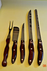 A Set Of Essential Cutco Knives - 4 Knives With Turning Fork And Storage Tray