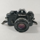 Nikon Em Slr 35mm Film Camera With 2 Lenses Flash Strap Manual   Case  Tested