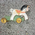 Vintage Wooden Horse Pull Toy On Wheels Painted Green Base White Horse