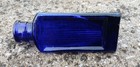 Very Small Triangular Shape Cobalt Blue Glass Poison Bottle