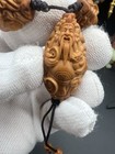 China Olive Full Body Hand Carved Eight Treasures God Of Wealth                                              