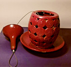 Hanging Ceramic Red Bird Feeder With Circular Swirl Design