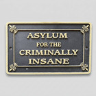 Asylum For The Criminally Insane Cast Iron Embossed Plaque