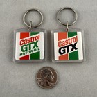 Lot Of 2 Castrol Gtx Motor Oil Vintage Keychains Key Rings  61883
