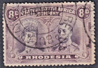 Rhodesia Double Heads - 8d Purple   Dull Purple  gash In Ear   used   cv   500 