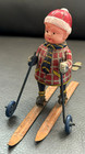 Early Occupied Japan Christmas 1940 s  Boy Santa Wind Up Skiing Wheels Celluloid